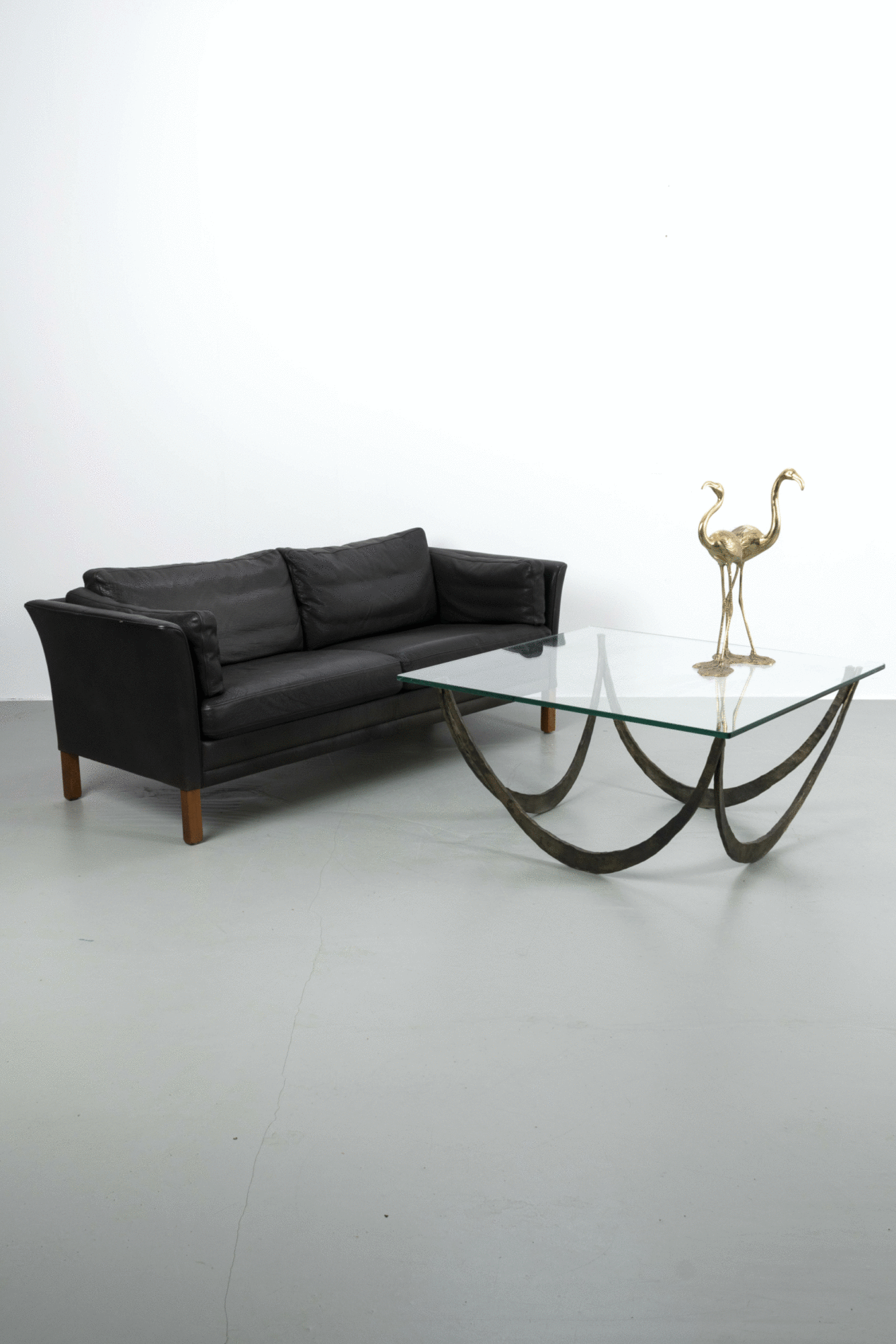 Bronzen salontafel met glazen blad