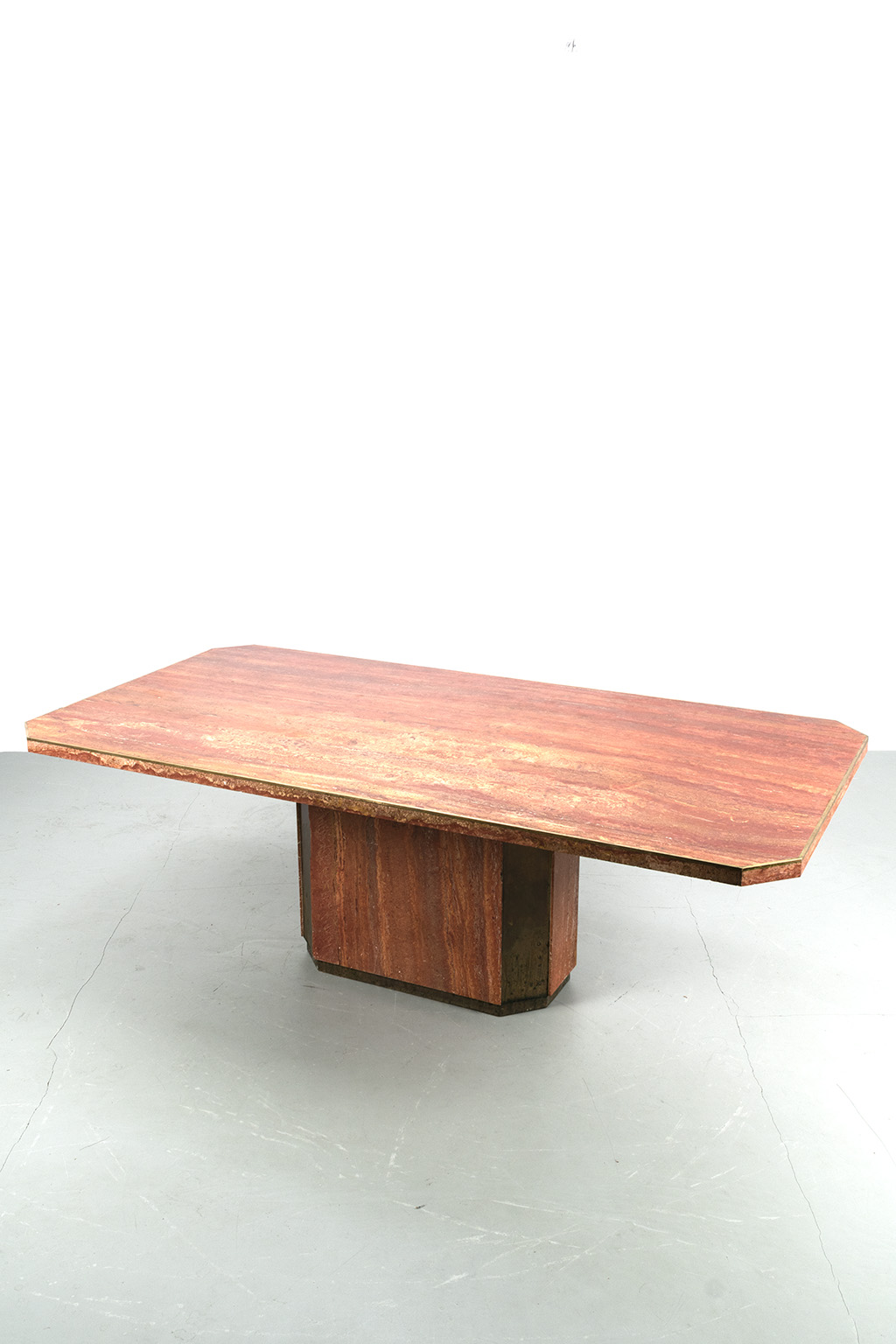 Red travertine dining table with bronze Paco Rabanne