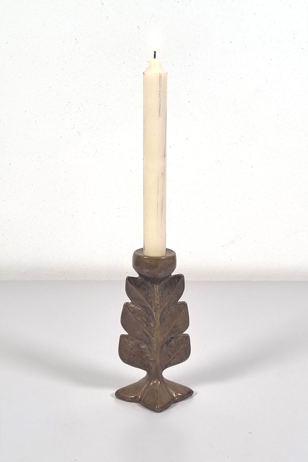 Bronze-colored candle holder